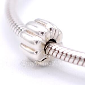 Authentic PANDORA  Ribbed Abstract Clip Charm - 790163